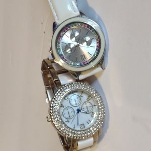 Two E Accutime JCR1042B Japan watches.